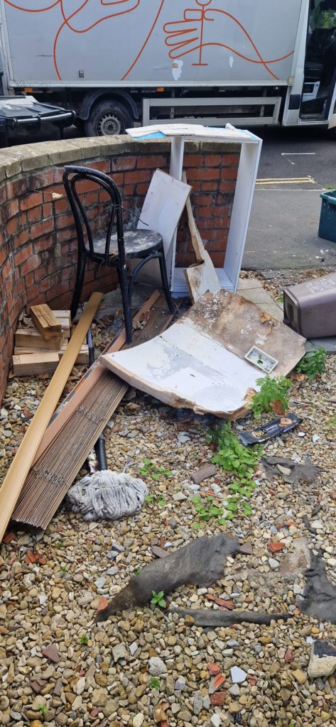 Professional team carrying sofas during house clearance Professional team carrying sofas during house clearance