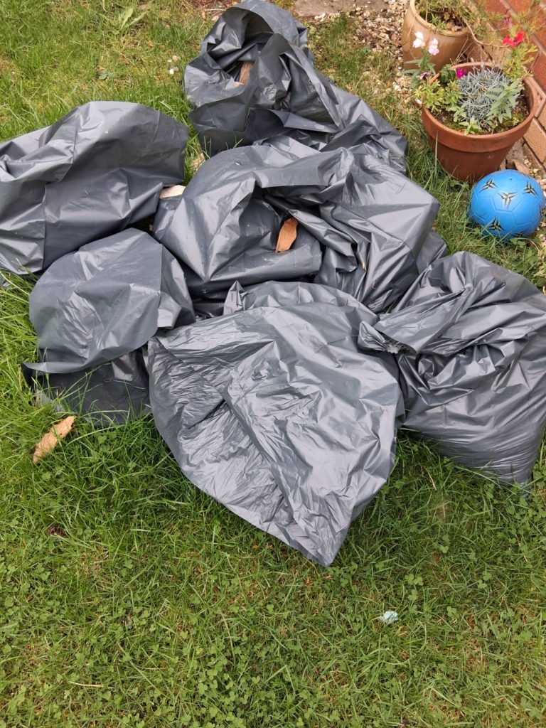 Bristol waste clearance truck loading unwanted items Bristol waste clearance truck loading unwanted items